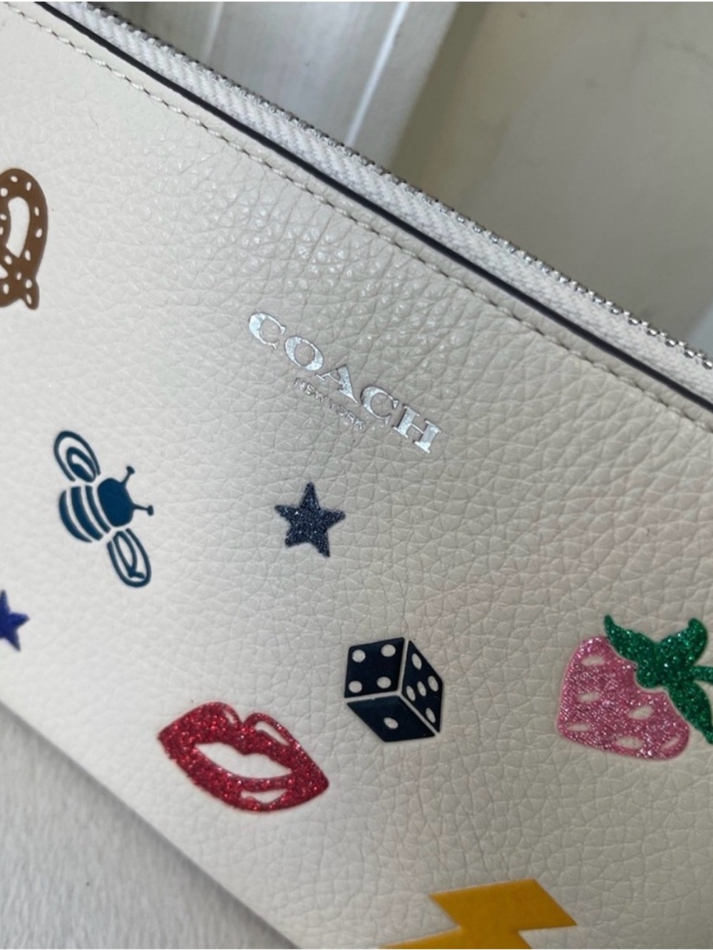 COACH- NWOT! Cream Pebbled Leather Wristlet with Colorful Patch Accents - Picture 2 of 8